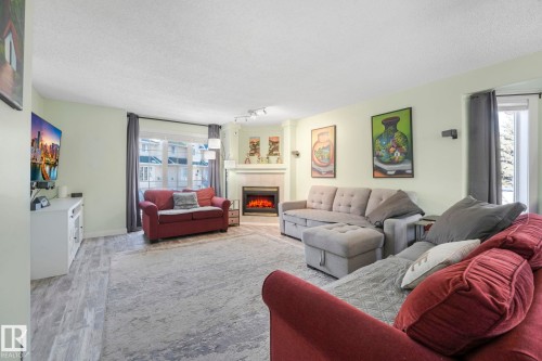 24 2419 133 Avenue, Edmonton, AB - Indoor Photo Showing Living Room With Fireplace