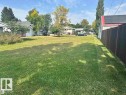 View of yard featuring a residential view - 4511 54 Avenue, Wetaskiwin, AB 