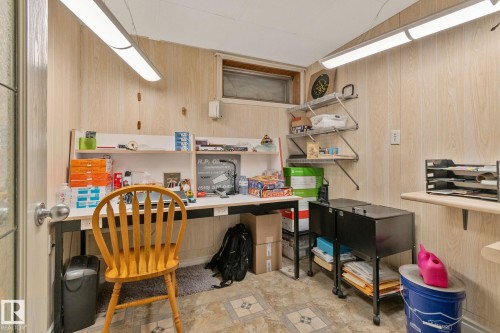 Office space with wooden walls and built in desk - 4231 39 Avenue, Leduc, AB - Indoor