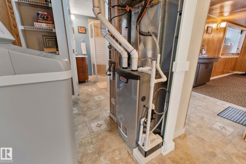 Utility room with heating unit - 4231 39 Avenue, Leduc, AB - Indoor Photo Showing Basement