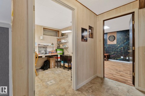 Hallway featuring an office area and baseboards - 4231 39 Avenue, Leduc, AB - Indoor Photo Showing Other Room