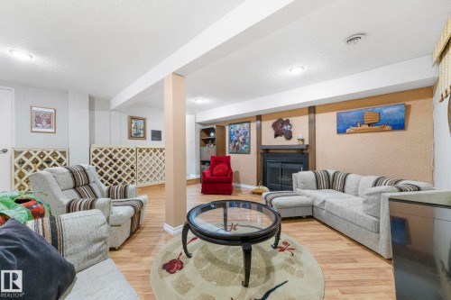 11126 173A Avenue, Edmonton, AB - Indoor Photo Showing Living Room With Fireplace