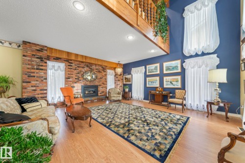 11126 173A Avenue, Edmonton, AB - Indoor Photo Showing Living Room With Fireplace