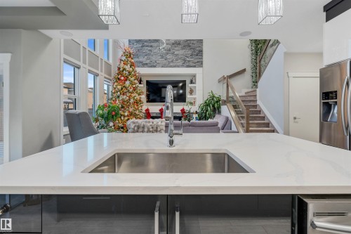17022 62 Street, Edmonton, AB - Indoor Photo Showing Kitchen With Fireplace