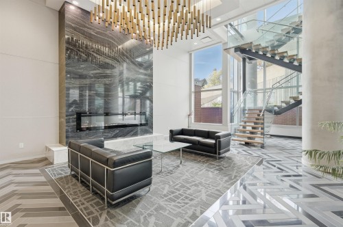 2002 9720 106 Street, Edmonton, AB - Indoor Photo Showing Other Room With Fireplace