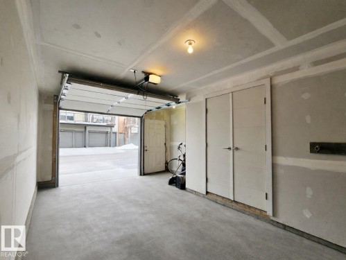 View of garage - 129 2560 Pegasus Boulevard, Edmonton, AB - Indoor Photo Showing Garage