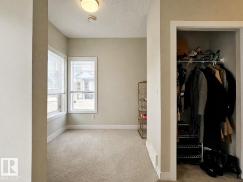 View of closet - 129 2560 Pegasus Boulevard, Edmonton, AB - Indoor Photo Showing Other Room