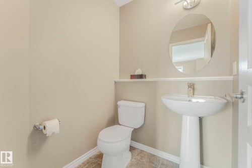 Bathroom with baseboards and toilet - 385 Secord Boulevard, Edmonton, AB - Indoor Photo Showing Bathroom