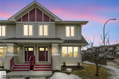View of front of house with a porch and a shingled roof - 385 Secord Boulevard, Edmonton, AB - Outdoor With Deck Patio Veranda With Facade