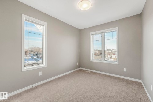 Another view of Bedroom 3 - 385 Secord Boulevard, Edmonton, AB - Indoor Photo Showing Other Room