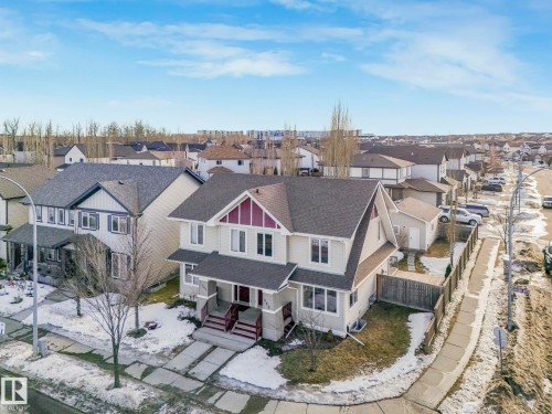 Aerial perspective of suburban area - 385 Secord Boulevard, Edmonton, AB - Outdoor With Deck Patio Veranda With Facade