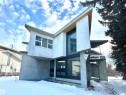 Snow covered rear of property featuring a balcony - 9535 147 Avenue, Edmonton, AB  - Outdoor 