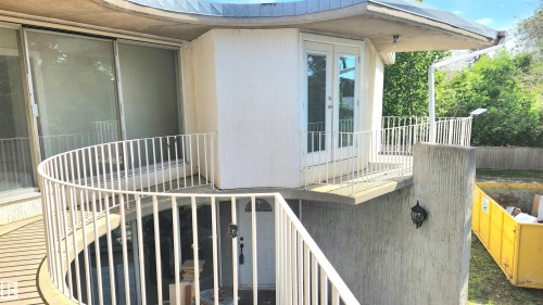 Property entrance featuring french doors - 9535 147 Avenue, Edmonton, AB - Outdoor With Deck Patio Veranda With Exterior