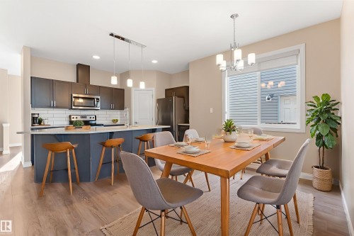 Virtually staged. - 332 West Haven Drive, Leduc, AB - Indoor Photo Showing Dining Room
