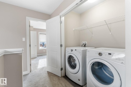 Upstairs laundry - 332 West Haven Drive, Leduc, AB - Indoor Photo Showing Laundry Room