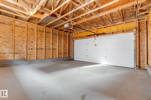 332 West Haven Drive, Leduc, AB - Indoor Photo Showing Garage