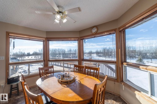 Breakfast, lunch or dinner/supper............sunlight and views abound - 57524 Range Road 270, Rural Westlock County, AB - Indoor Photo Showing Dining Room