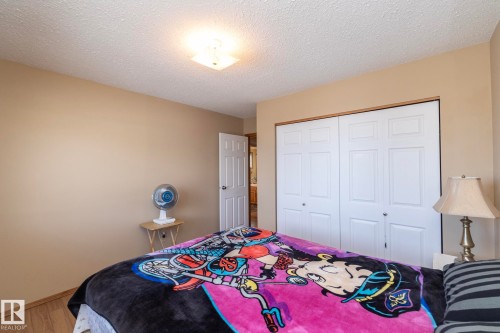 Third of three bedrooms on the main level. East facing window brings in the morning light to greet you. - 57524 Range Road 270, Rural Westlock County, AB - Indoor Photo Showing Bedroom