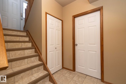 Stairway up/down from back entry way and to the upper level. - 57524 Range Road 270, Rural Westlock County, AB - Indoor Photo Showing Other Room