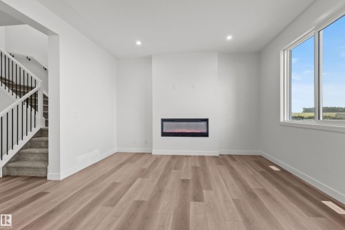 2124 Muckleplum Crescent, Edmonton, AB - Indoor With Fireplace