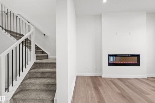 2124 Muckleplum Crescent, Edmonton, AB - Indoor With Fireplace