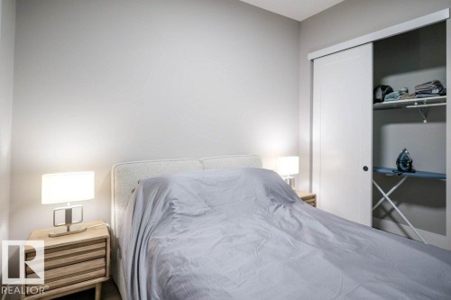 Bedroom with a closet - 101 7471 May Common, Edmonton, AB - Indoor Photo Showing Bedroom