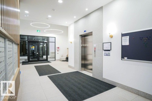 Building lobby featuring recessed lighting and a high ceiling - 101 7471 May Common, Edmonton, AB - Indoor Photo Showing Other Room