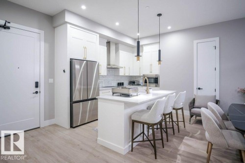 101 7471 May Common, Edmonton, AB - Indoor Photo Showing Kitchen With Upgraded Kitchen