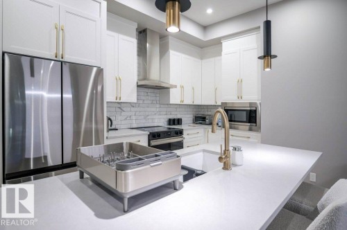 101 7471 May Common, Edmonton, AB - Indoor Photo Showing Kitchen With Upgraded Kitchen