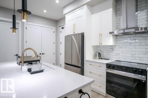 101 7471 May Common, Edmonton, AB - Indoor Photo Showing Kitchen With Upgraded Kitchen