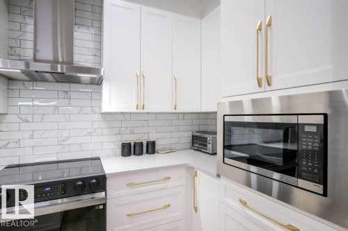 101 7471 May Common, Edmonton, AB - Indoor Photo Showing Kitchen