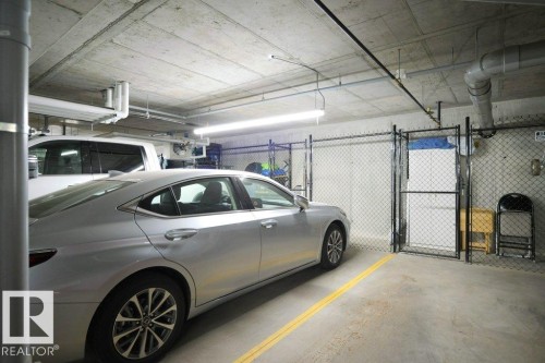 101 7471 May Common, Edmonton, AB - Indoor Photo Showing Garage
