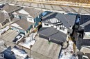 Snowy aerial view with a residential view - 3520 49 Avenue, Beaumont, AB  - Outdoor 
