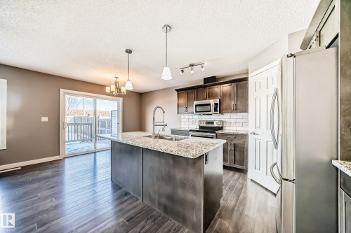 3520 49 Avenue, Beaumont, AB - Indoor Photo Showing Kitchen With Double Sink With Upgraded Kitchen