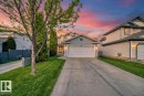 Traditional home featuring driveway and an attached garage - 4604 202 Street, Edmonton, AB  - Outdoor With Facade 