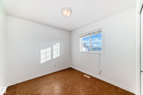 Spare room with baseboards - 4604 202 Street, Edmonton, AB - Indoor Photo Showing Other Room