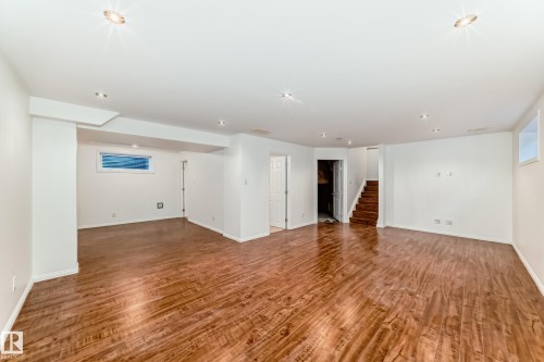 Spare room with wood finished floors - 4604 202 Street, Edmonton, AB - Indoor Photo Showing Other Room