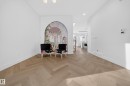 Sitting room with parquet flooring, recessed lighting, and stairs - 132 29 Street, Edmonton, AB  - Indoor Photo Showing Other Room 