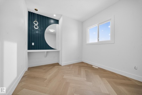 Unfurnished room with parquet floors and recessed lighting - 132 29 Street, Edmonton, AB - Indoor Photo Showing Other Room
