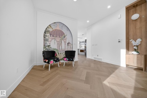 Sitting room featuring parquet floors and recessed lighting - 132 29 Street, Edmonton, AB - Indoor Photo Showing Other Room