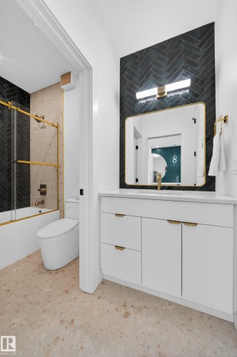 Bathroom with enclosed tub / shower combo and vanity - 132 29 Street, Edmonton, AB - Indoor Photo Showing Bathroom