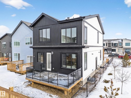 View of front of property featuring a deck and a residential view - 132 29 Street, Edmonton, AB - Outdoor With Exterior