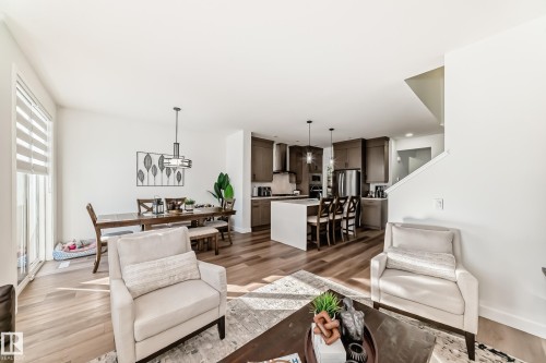 Living area with light wood-style flooring - 3569 Erlanger Link, Edmonton, AB - Indoor Photo Showing Living Room