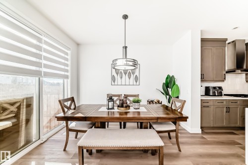 Dining space featuring light wood-style flooring - 3569 Erlanger Link, Edmonton, AB - Indoor Photo Showing Dining Room