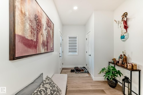 Hall with light wood-type flooring and recessed lighting - 3569 Erlanger Link, Edmonton, AB - Indoor Photo Showing Other Room