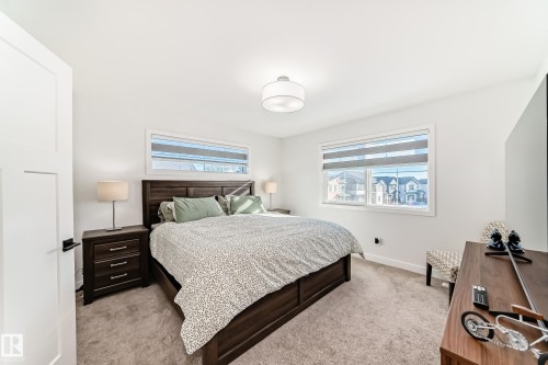 Bedroom with light colored carpet - 3569 Erlanger Link, Edmonton, AB - Indoor Photo Showing Bedroom