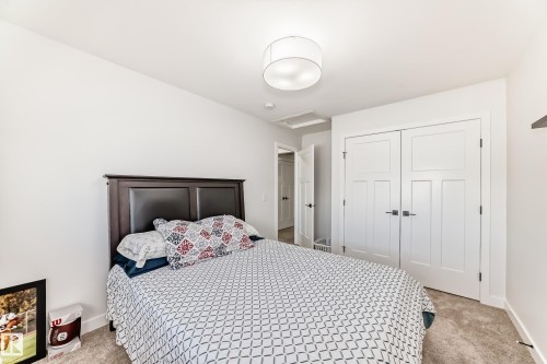Bedroom with carpet and a closet - 3569 Erlanger Link, Edmonton, AB - Indoor Photo Showing Bedroom