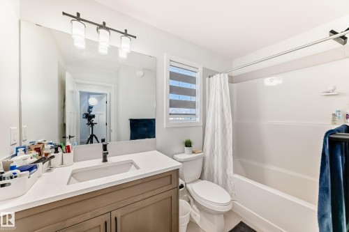 Full bathroom with vanity and shower / bath combination with curtain - 3569 Erlanger Link, Edmonton, AB - Indoor Photo Showing Bathroom