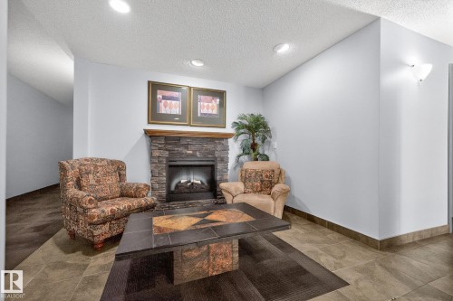 108 10403 98 Avenue, Edmonton, AB - Indoor With Fireplace
