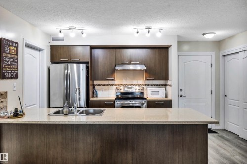 2405 7343 South Terwillegar Drive, Edmonton, AB - Indoor Photo Showing Kitchen With Stainless Steel Kitchen With Double Sink With Upgraded Kitchen